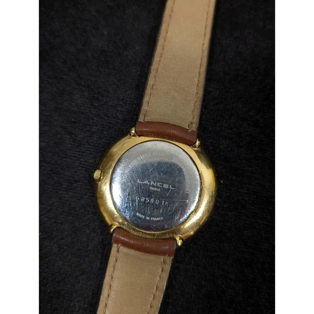 Vintage Lancel‎ Paris Gold Tone Round Case Brown Leather Band Watch